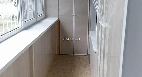 Вікна Vigrand і повний недорогий ремонт балкону - головне фото